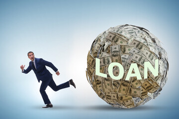 Businessman running away in debt and loan concept