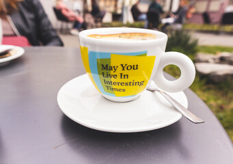Interesting message written on the coffee mug reflecting the hard times during global corona virus pandemic