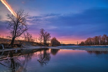 Vibrant Sunrise Reflections Over The Bow River