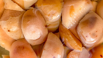 Apple compote in a glass 5 liter jar. View from above. Close-up.