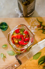 Pepper sauce on wooden board and many ingredients