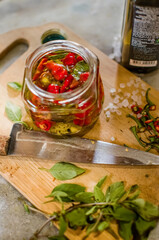 Pepper sauce on wooden board and many ingredients