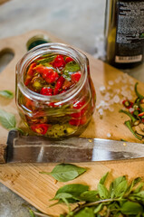 Pepper sauce on wooden board and many ingredients