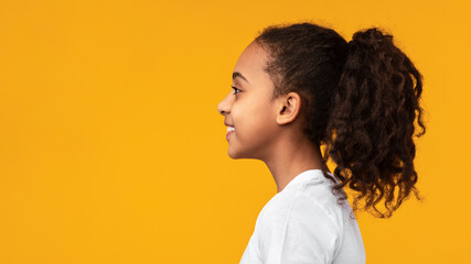 Side view profile portrait of cute African American girl