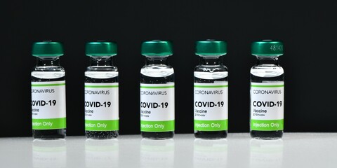 Vaccination treatment Covid-19 Coronavirus 2019 ncov virus. Numerous bottles in a research laboratory ready to be analyzed and compared before being put on sale