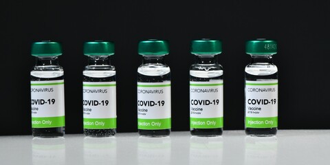 Vaccination treatment Covid-19 Coronavirus 2019 ncov virus. Numerous bottles in a research laboratory ready to be analyzed and compared before being put on sale