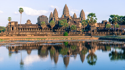 Fototapeta na wymiar angkor wat cambodia in sunset with reflections on the water