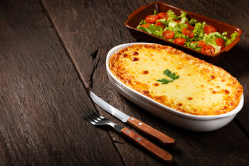 Shepherd's Pie (escondidinho) with salad and rice. Typical Brazilian food.