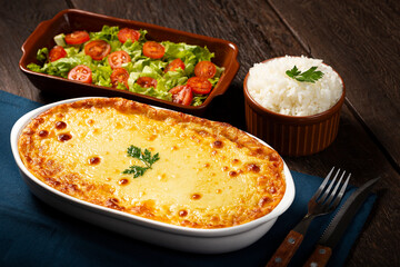 Shepherd's Pie (escondidinho) with salad and rice. Typical Brazilian food.