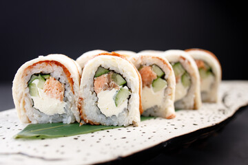 Seafood delicatessen unagi sushi rolls on plate