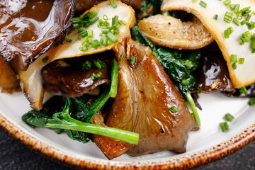 Vegan saute with mushrooms, aubergines and spinach