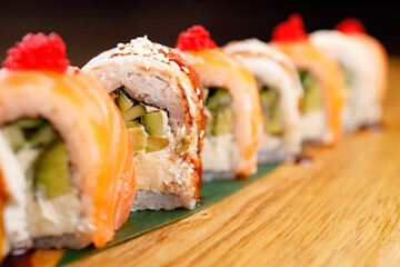 Seafood delicatessen sushi rolls set on board