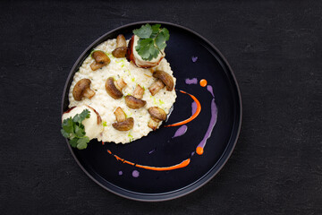 Delicious mushroom risotto and grilled turkey meat