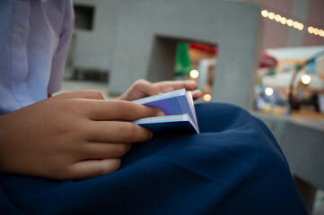 selective focus of primary school girl reading book on free time