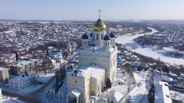 Scenic aerial view of main Orthodox church in Russian city of Yelets, five domed Ascension Cathedral on sunny winter day