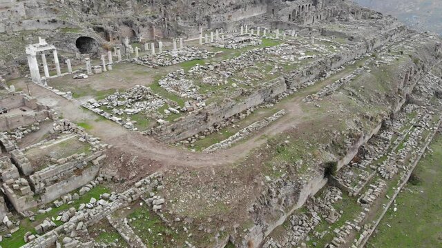 Aerial view of ruined acropolis of antique greek city Pergamon near modern city of Bergama, Turkey. High quality 4k footage