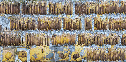 wall damaged by explosion bomb, texture of damaged old brick wall