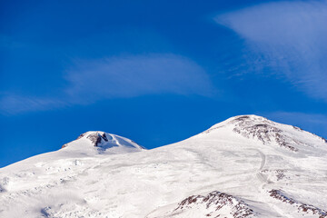 The peaks of Elbrus from the last station. Photo of the mountain caps from a height of 4000 meters.