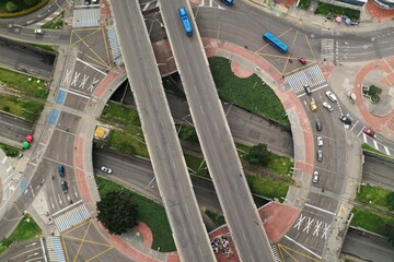 Car bridge over roundabout on avenida 100, an avenue that is very busy with people and passersby. Bogotá Colombia