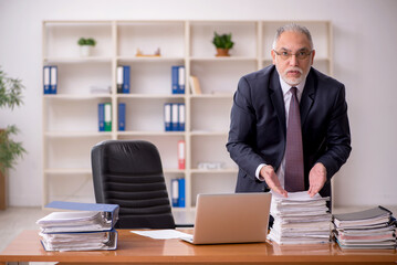 Old male employer and too much work in the office