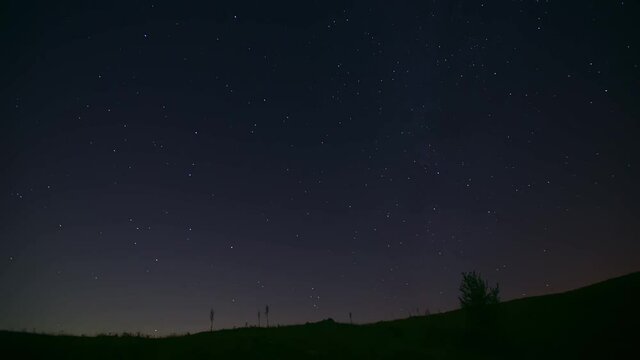 Time Lapse Shot Of The Dark Blue Starry Sky In An Italian Town