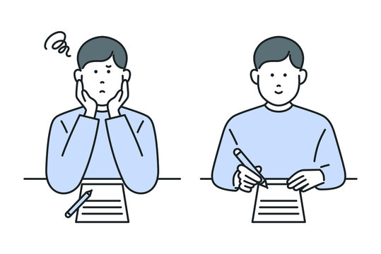 書類を書く　悩んでいる男性