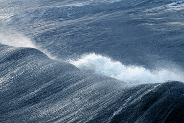 Huge Ocean Wave Breaking Hard During a Hurricane