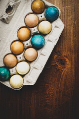 Fototapeta na wymiar Hard-boiled eggs colored with natural dyes