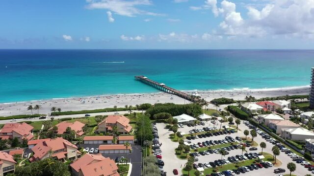 Aerial footage Juno Beach fishing pier 4k