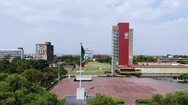 aerial view of university city mexico city. clear blue sky background with university study buildings. green garden and sunny day