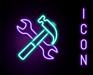 Glowing neon line Crossed hammer and wrench icon isolated on black background. Hardware tools. Colorful outline concept. Vector