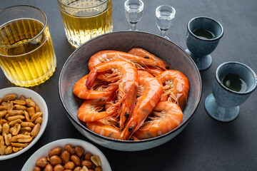 A plate of boiled shrimp and fine wine