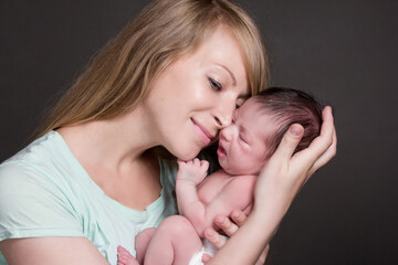 photo of a baby girl, with blonde mom