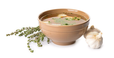 Bowl with tasty garlic soup on white background
