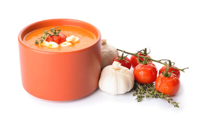 Bowl with tasty tomato cream soup on white background