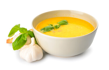 Bowl with tasty garlic cream soup on white background