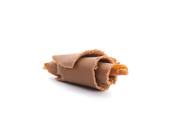 Delicious chocolate curl on white background