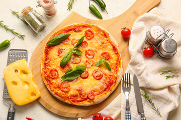 Board with tasty pizza on table, closeup