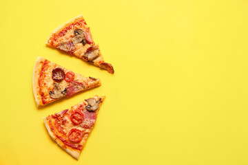 Pieces of tasty pizza on color background