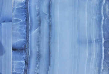 Stone texture in blue with white streaks in the form of the seabed
