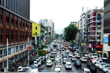 A busy heavy traffic street of Yangon, the capital of Myanmar. Life before the military coup seized...