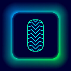 Glowing neon line Car tire icon isolated on black background. Colorful outline concept. Vector