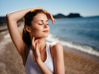 Fototapeta na wymiar Pretty woman in white swimsuit charm sun enjoying nature island