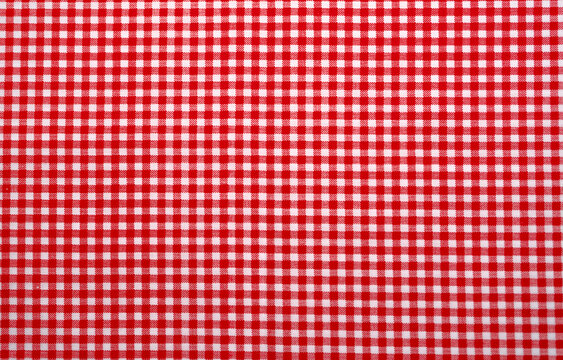 Red And White Checkered Tablecloth. Top View Table Cloth Texture Background. Red Gingham Pattern Fabric. Picnic Blanket Texture. Red Table Cloth For Italian Food Menu. Square Pattern Of Gingham.