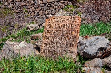 Medieval Armenian scripture carved on a stone at the Havuts Tar monastery in Armenia