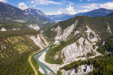 Dramatic aerial view of the Rhine gorge near Reichenau and Films in Canton Graubunden in the alps in Switzerland on a sunny summer day