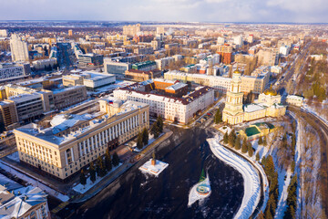 Fototapeta premium Top view of the Christ-Nativity Cathedral in the city center and residential buildings in winter in Lipetsk, Russia