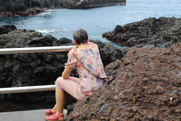 Woman looking at the sea
