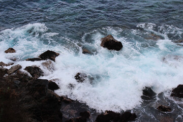 Waves of the sea pounding on the rocks