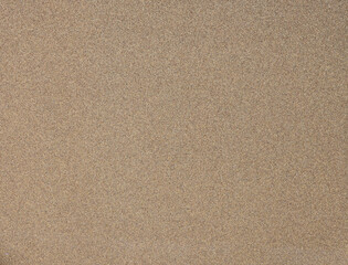 Fototapeta na wymiar Texture of brown sandpaper texture.